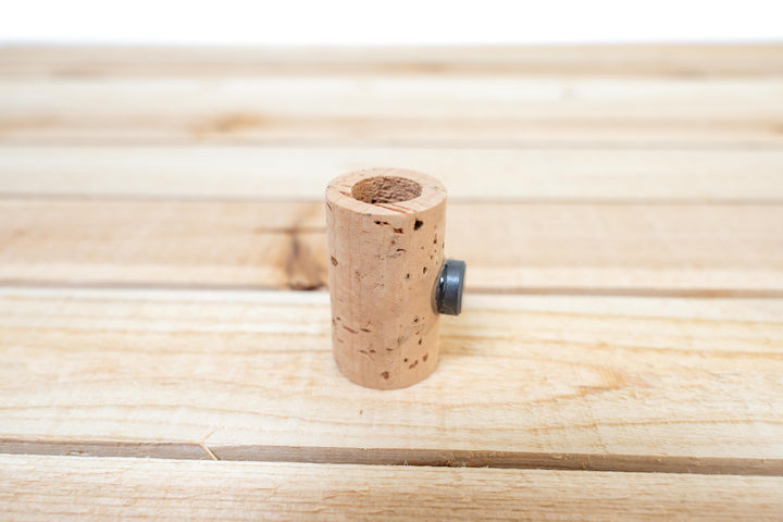 wine cork with hole drilled for air plant and magnet