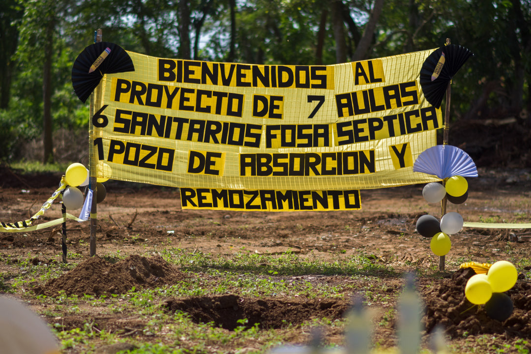 banner announcing new school