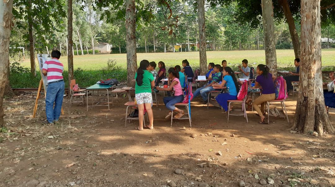 children in an outdoor classroom in Guatemala