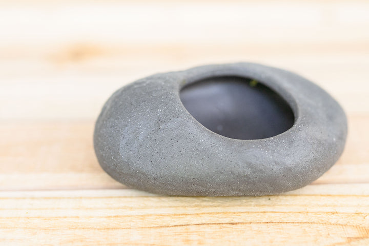 gray ceramic stone planter